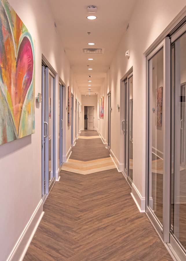 Hallway of private salon suites at Shear Salon